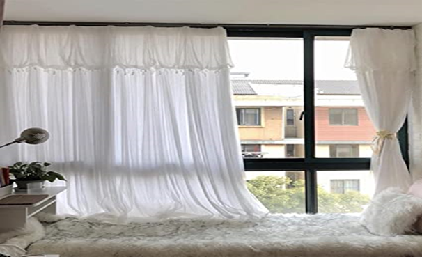 Incorporate Light-Filtering Flowy Curtains