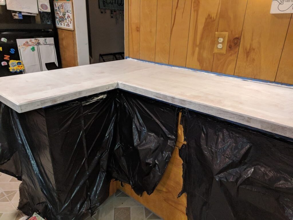Use Tape to Cover the Surfaces Surrounding the Cabinets